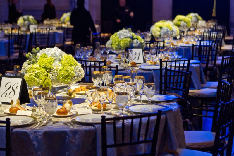 Event banquet tables and dinnerware for event at Detroit Institute of Art