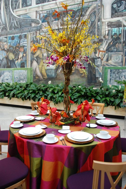 Linen-covered banquet tables for event at Detroit Institute of Art