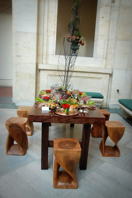 Modern wooden banquet table for event at Detroit Institute of Arts