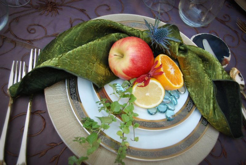 Fruit table decor on dinnerware for event at Detroit Institute of Arts
